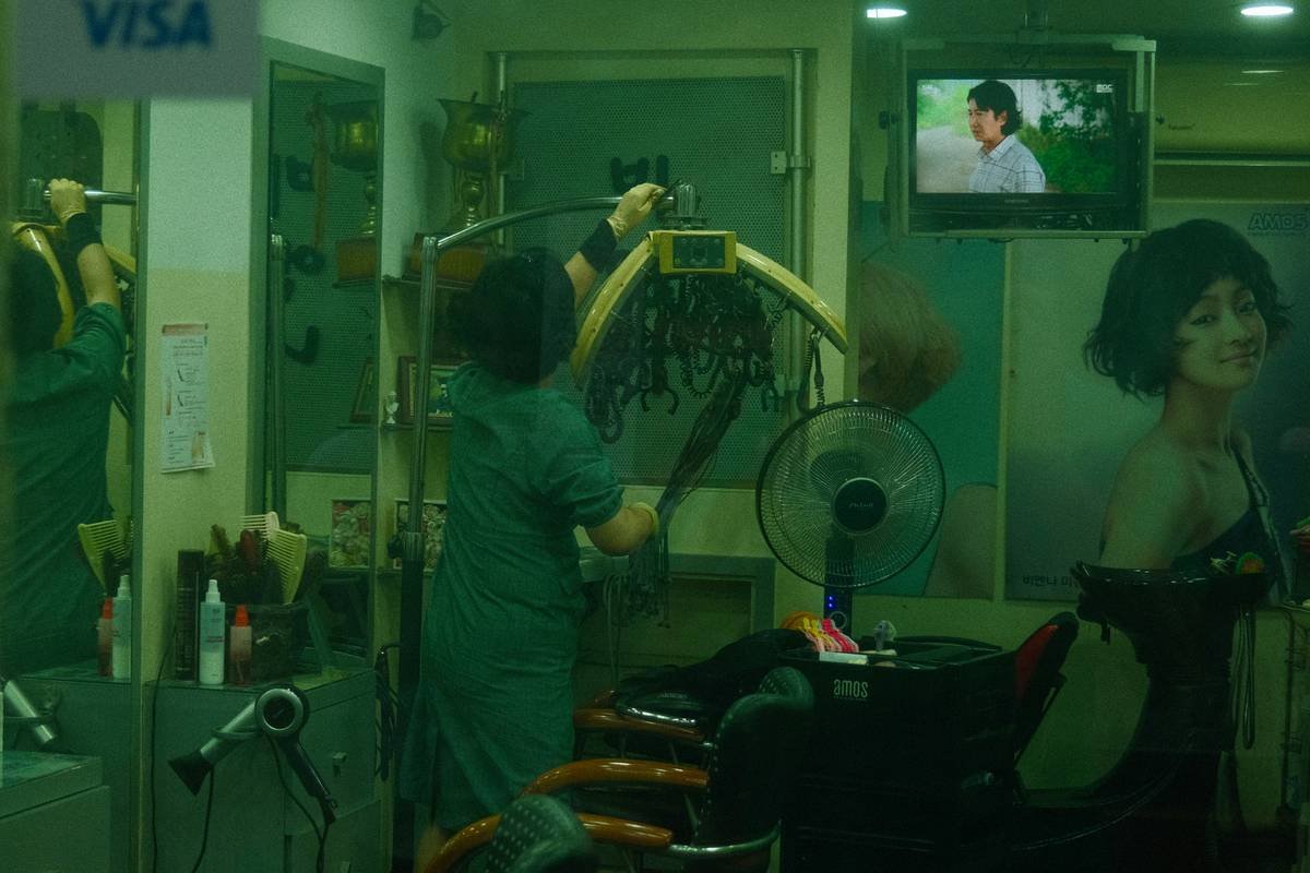 A close-up shot of velcro hair rollers neatly arranged on a vanity counter.