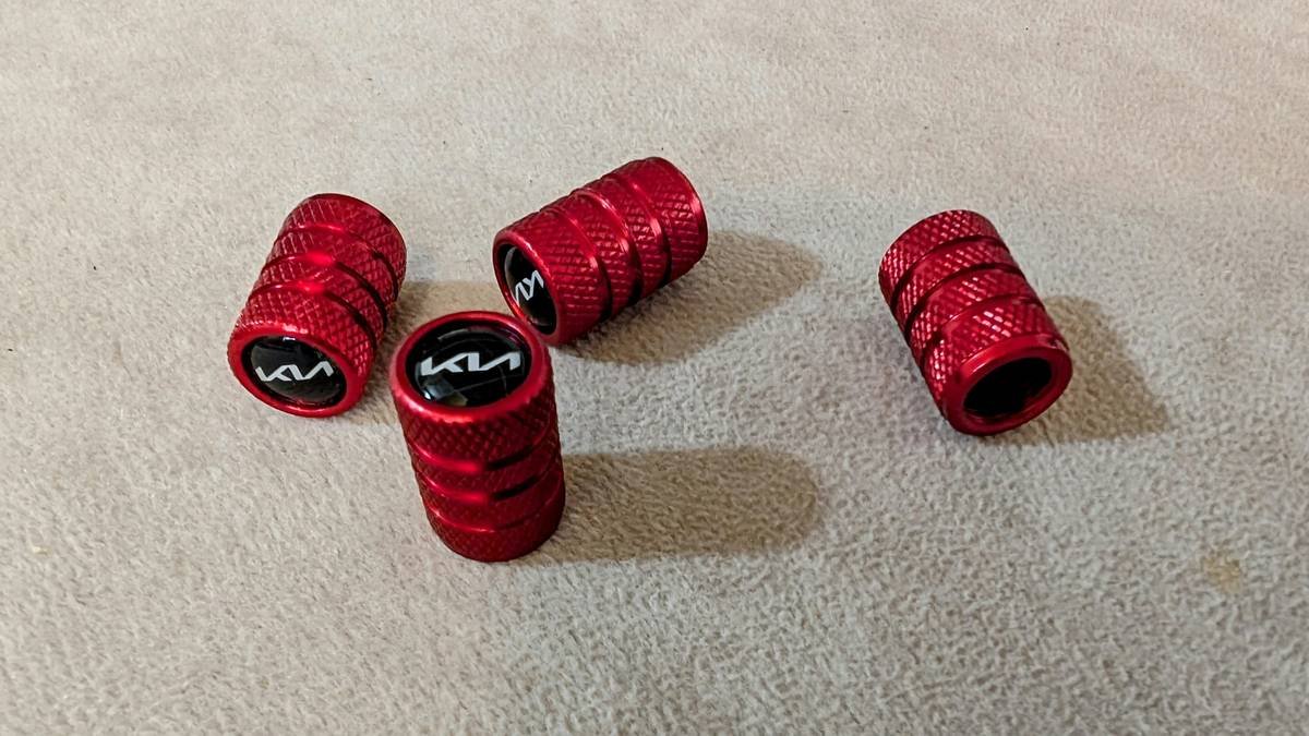 Woman styling her hair with heat rollers