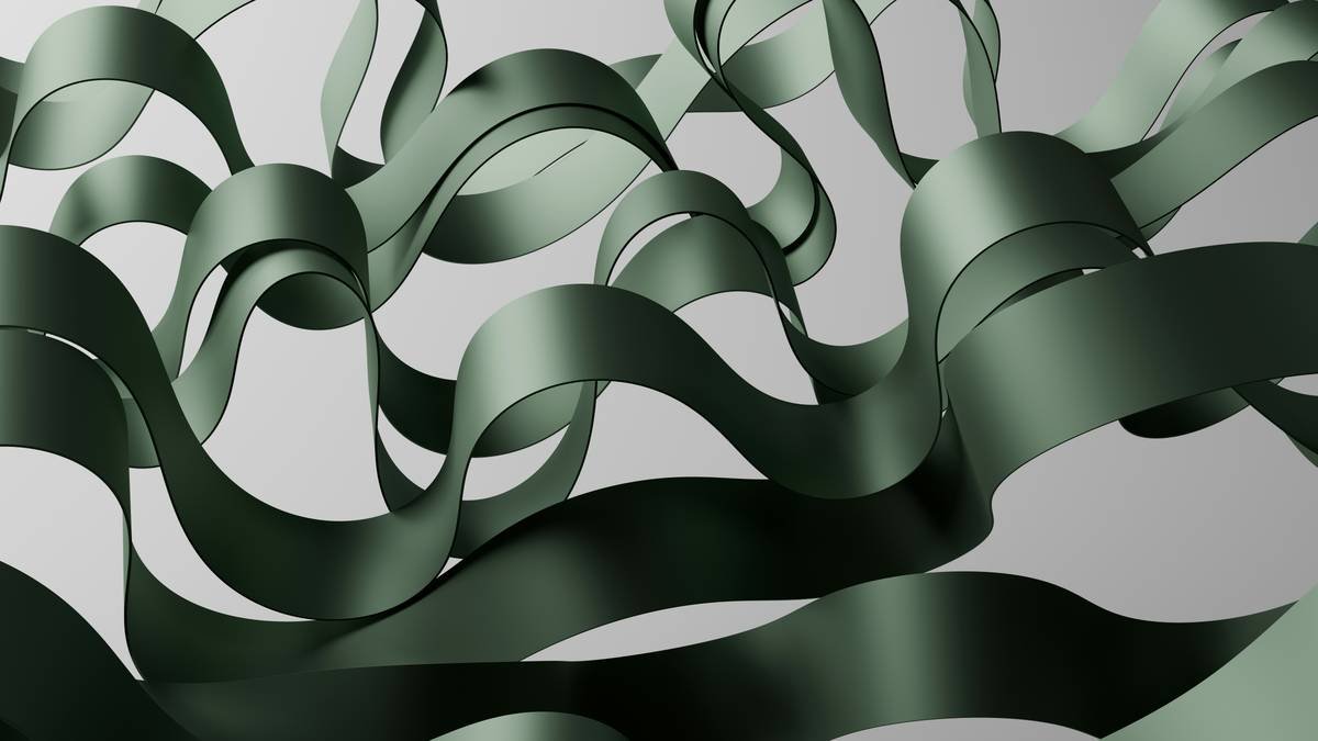 Close-up of hands wrapping damp hair around a satin curl ribbon for heatless styling